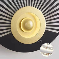 Applique murale LED ronde Art Déco pour une ambiance chaleureuse  | Marco Lucetti