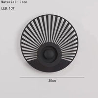 Applique murale LED ronde Art Déco pour une ambiance chaleureuse  | Marco Lucetti A noir / Lumière chaude 3000K