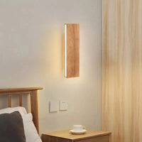 Applique murale LED rotative en bois design | Marco Lucetti
