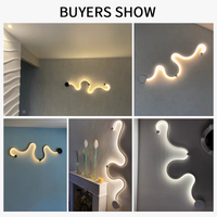 Applique murale design en acrylique et fer LED pour une décoration tendance