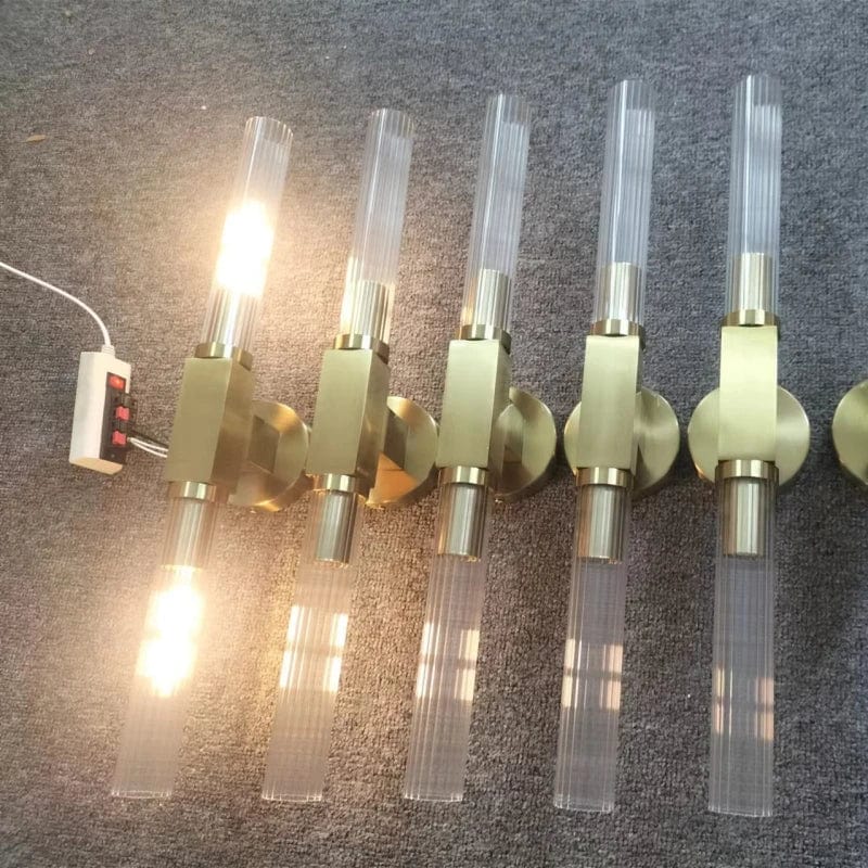 Applique murale nordique en verre transparent et métal doré | Marco Lucetti