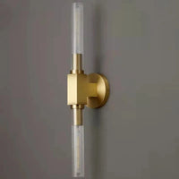 Applique murale nordique en verre transparent et métal doré | Marco Lucetti