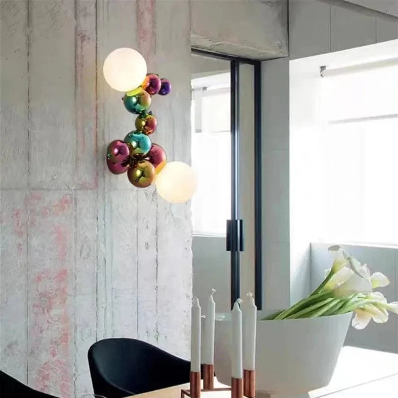 Applique murale postmoderne boule de verre haricot magique en acier de luxe | Marco Lucetti