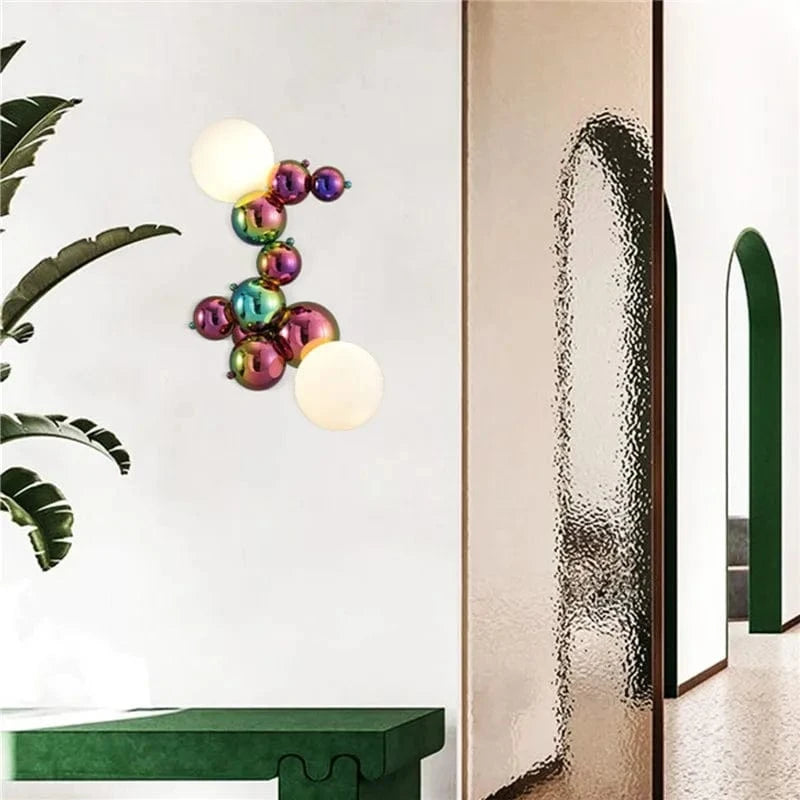 Applique murale postmoderne boule de verre haricot magique en acier de luxe | Marco Lucetti