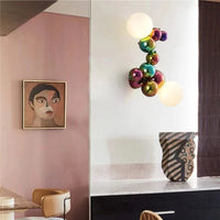 Applique murale postmoderne boule de verre haricot magique en acier de luxe | Marco Lucetti
