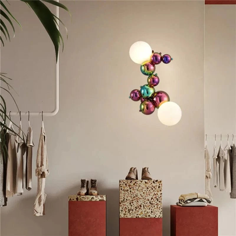 Applique murale postmoderne boule de verre haricot magique en acier de luxe | Marco Lucetti