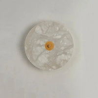 Applique murale ronde en marbre LED pour un éclairage chaleureux et moderne | Marco Lucetti