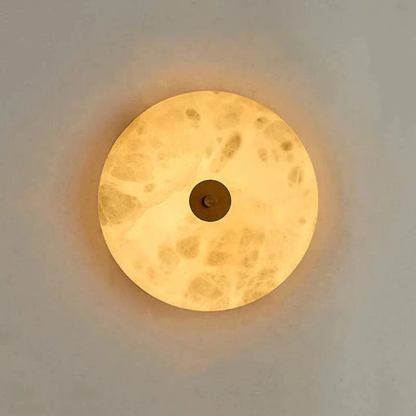 Applique murale ronde en marbre LED pour un éclairage chaleureux et moderne | Marco Lucetti