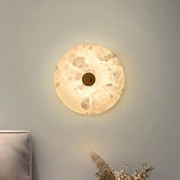 Applique murale ronde en marbre LED pour un éclairage chaleureux et moderne | Marco Lucetti