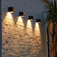 Applique solaire extérieure lumineuse pour jardin, terrasse et couloir - Squa | Marco Lucetti