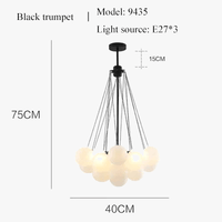 Boules de verre blanches modernes : suspension lumières pour décor intérieur | Marco Lucetti