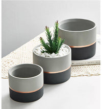 Cache-pot sur pied bas design effet Ciment Ultima | Marco Lucetti