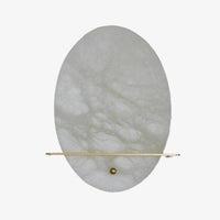 Applique murale LED ovale en marbre blanc et socle doré.