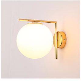 Design : Applique luminaire avec branche dorée et boule en verre | Marco Lucetti