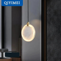 Éclairage Suspendu de Luxe en Marbre pour Restaurants Chic | Marco Lucetti