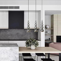 Gourde Minimaliste: Suspension Marque-Page | Marco Lucetti