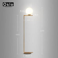 Lampadaire design doré LED avec boule de verre | Marco Lucetti Lampadaire