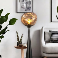 Lampadaire Doré - Luxéra | Marco Lucetti Lumière naturelle