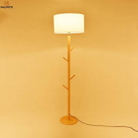 Lampadaire élégant en tissu et bois branches | Marco Lucetti