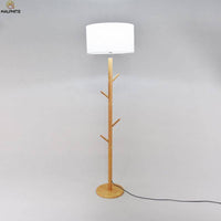 Lampadaire élégant en tissu et bois branches | Marco Lucetti