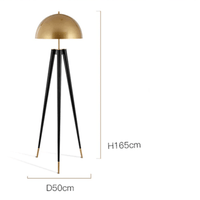 Lampadaire LED tripod noir et or de style design. | Marco Lucetti B