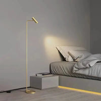 Lampadaire rotatif en laiton minimaliste avec 3 niveaux d'éclairage | Marco Lucetti