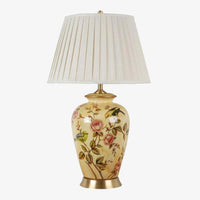 Lampe à poser LED en céramique jaune.