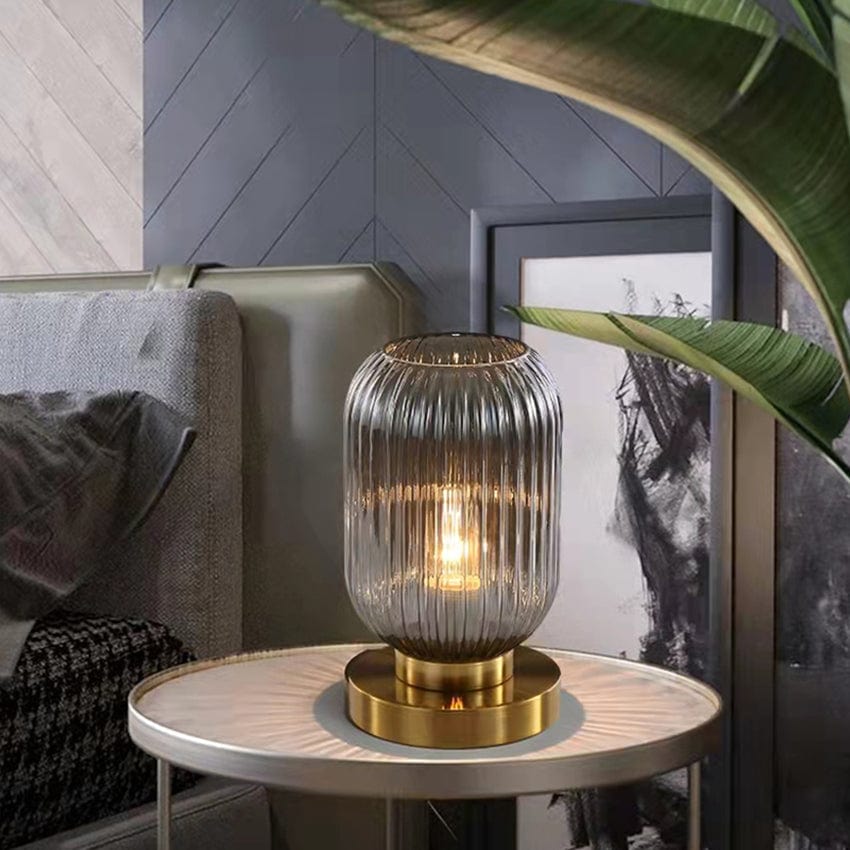 Lampe à poser Quinn en verre coloré et base dorée | Marco Lucetti