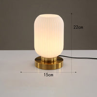 Lampe à poser Quinn en verre coloré et base dorée | Marco Lucetti D