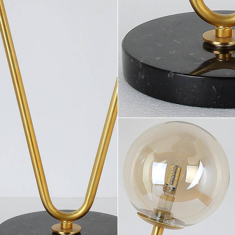 Lampe de chevet à deux branches dorées et boules en verre | Marco Lucetti