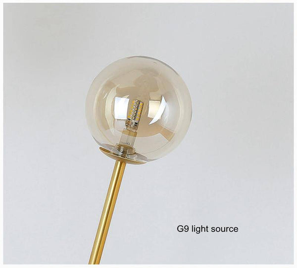 Lampe de chevet à deux branches dorées et boules en verre | Marco Lucetti