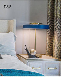 Lampe de chevet dorée Mesa. | Marco Lucetti