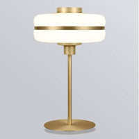 Lampe de chevet moderne LED à pied doré et forme arrondie. | Marco Lucetti