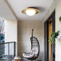 Lampe de plafond en pierre jaune Wabi-sabi pour décorer votre couloir ou votre balcon en Europe du Nord | Marco Lucetti