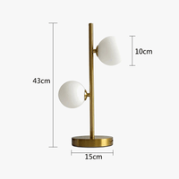 Lampe de table NordLume en boule de verre, design nordique, en fer ou en or