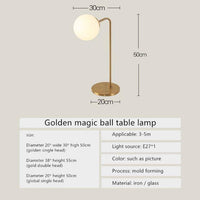 Lampe LED dorée avec boule en verre - Choix de formes | Marco Lucetti