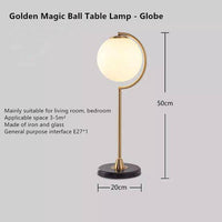 Lampe LED dorée avec boule en verre - Choix de formes | Marco Lucetti