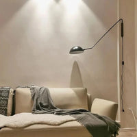 Lampe murale pivotante LED design minimaliste pour chambre et salon | Marco Lucetti