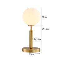 Lampe Ivy : Lumière ronde, base dorée