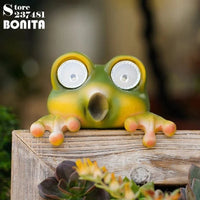 Lampe solaire de jardin grenouille coquine studieuse en résine avec Led Bub lumière waterproof | Marco Lucetti