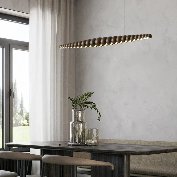 Lampe suspendue en bois moderne pour îlot de cuisine : éclairage linéaire LED | Marco Lucetti