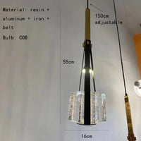 Lampe suspendue en résine et cuir synthétique ajustable en hauteur. | Marco Lucetti UN / Blanc chaud