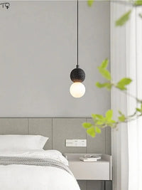 Lampe suspendue exclusive en pierre avec trou noir - Parfaite pour bar ou studio | Marco Lucetti
