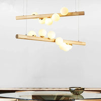 LED longue suspension en bois lumières boule de verre luxueuse Art Design  | Marco Lucetti