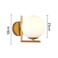 Luminaire contemporain avec boule en verre noir ou doré | Marco Lucetti