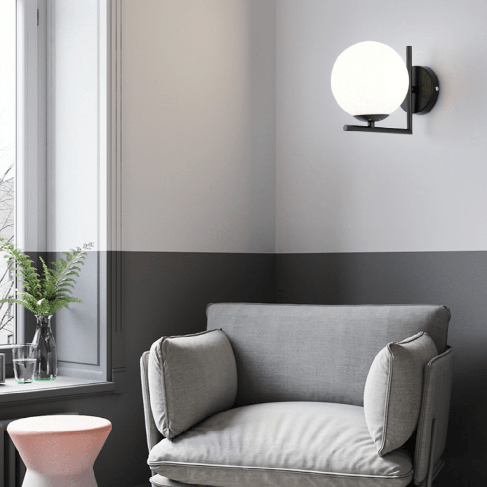 Luminaire contemporain avec boule en verre noir ou doré | Marco Lucetti