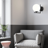 Luminaire contemporain avec boule en verre noir ou doré | Marco Lucetti