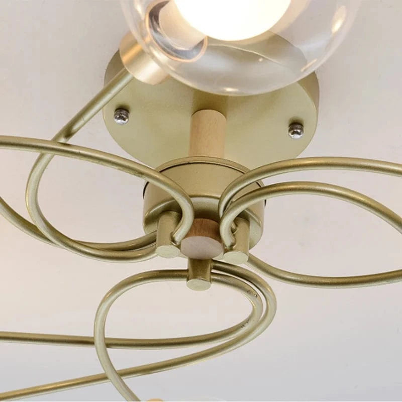 Lustre boule de verre nordique or noir pour décor maison et éclairage - Collection Nordika | Marco Lucetti