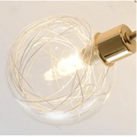 Lustre boule de verre nordique or noir pour décor maison et éclairage - Collection Nordika | Marco Lucetti Abat-jour Luce / Corps de lampe doré / 6 têtes | Blanc froid