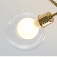 Lustre boule de verre nordique or noir pour décor maison et éclairage - Collection Nordika | Marco Lucetti Balle en balle / Corps de lampe doré / 6 têtes | Blanc froid